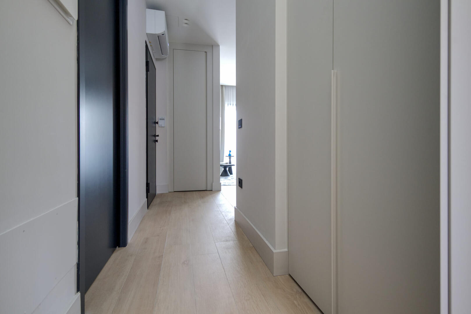 King-size bed with a quality mattress and premium linens. Custom-made pillows.